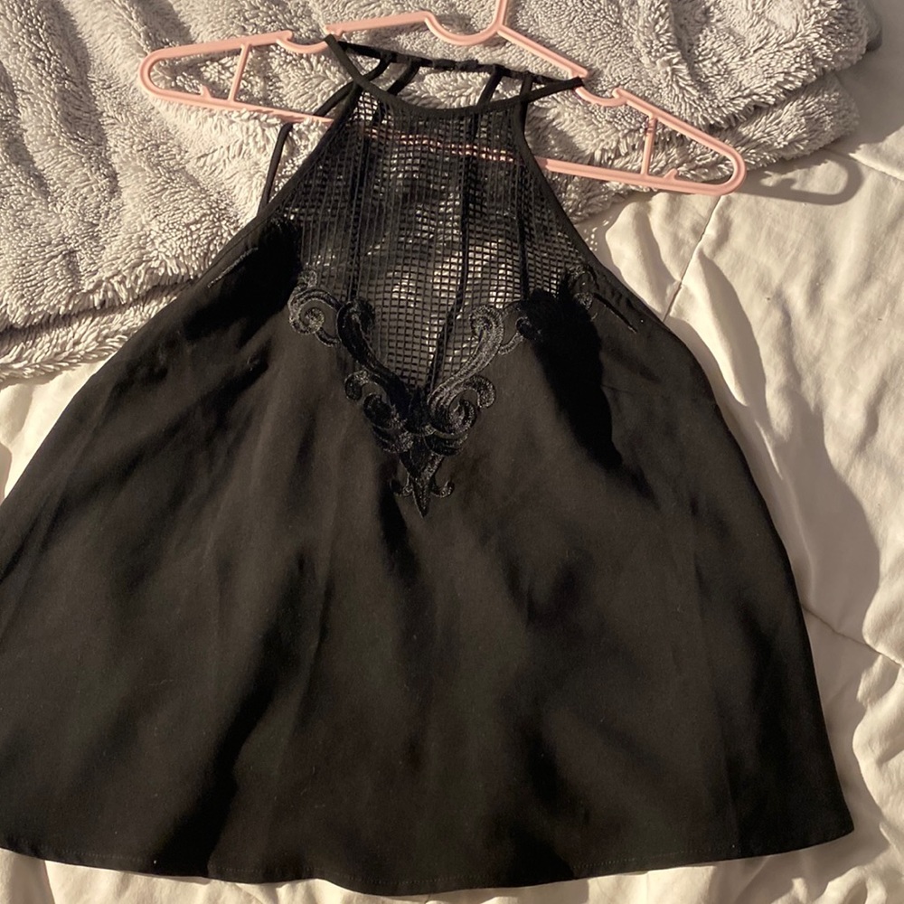 Mesh blouse. Flowy